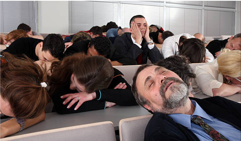 A bored audience dozing during a vendor-centric presentation